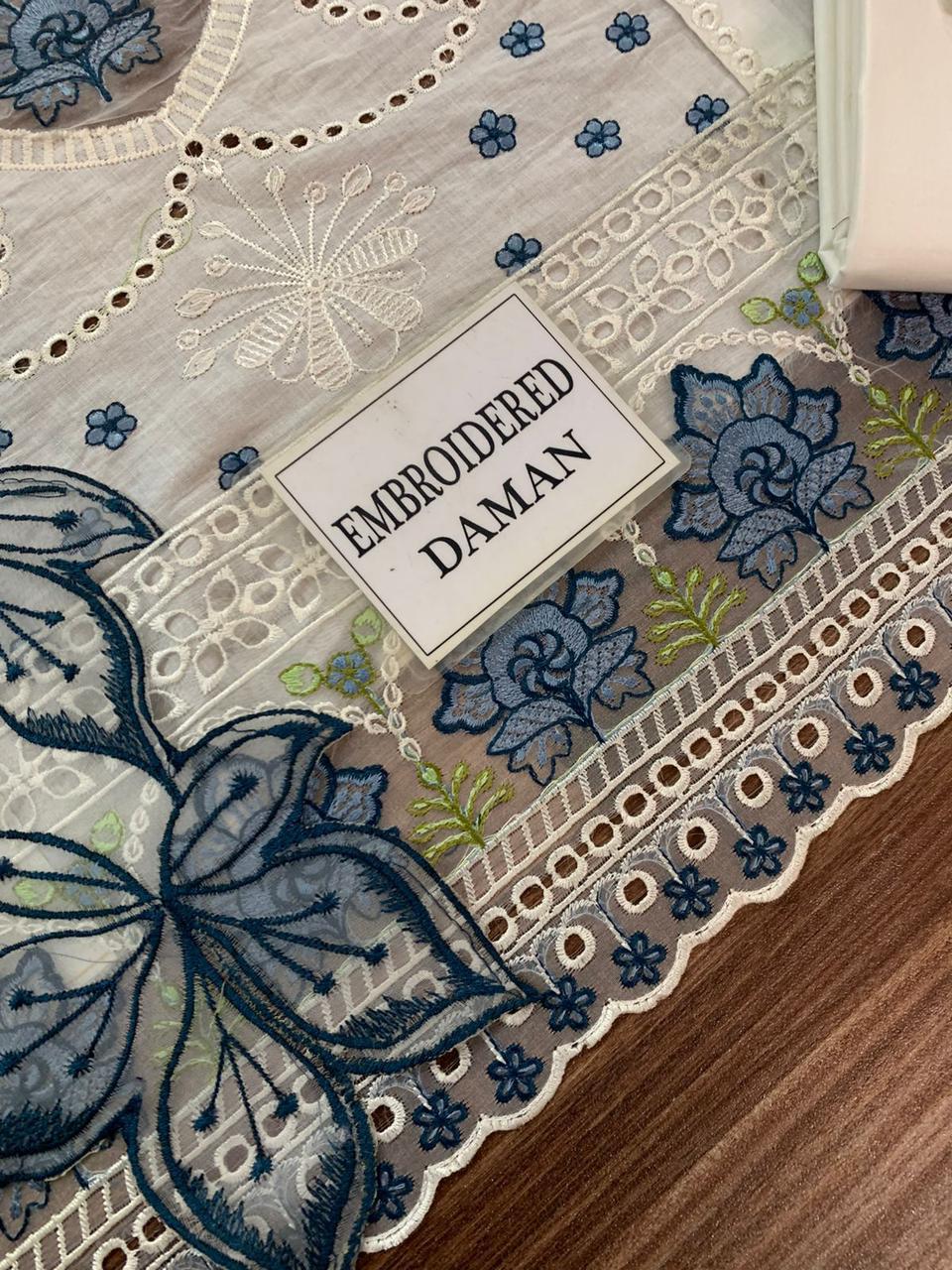 MAHNUR | Pearl Bloom – Ivory Embroidered Lawn 3-Piece Suit with Blue Floral Threadwork & Cutwork Details