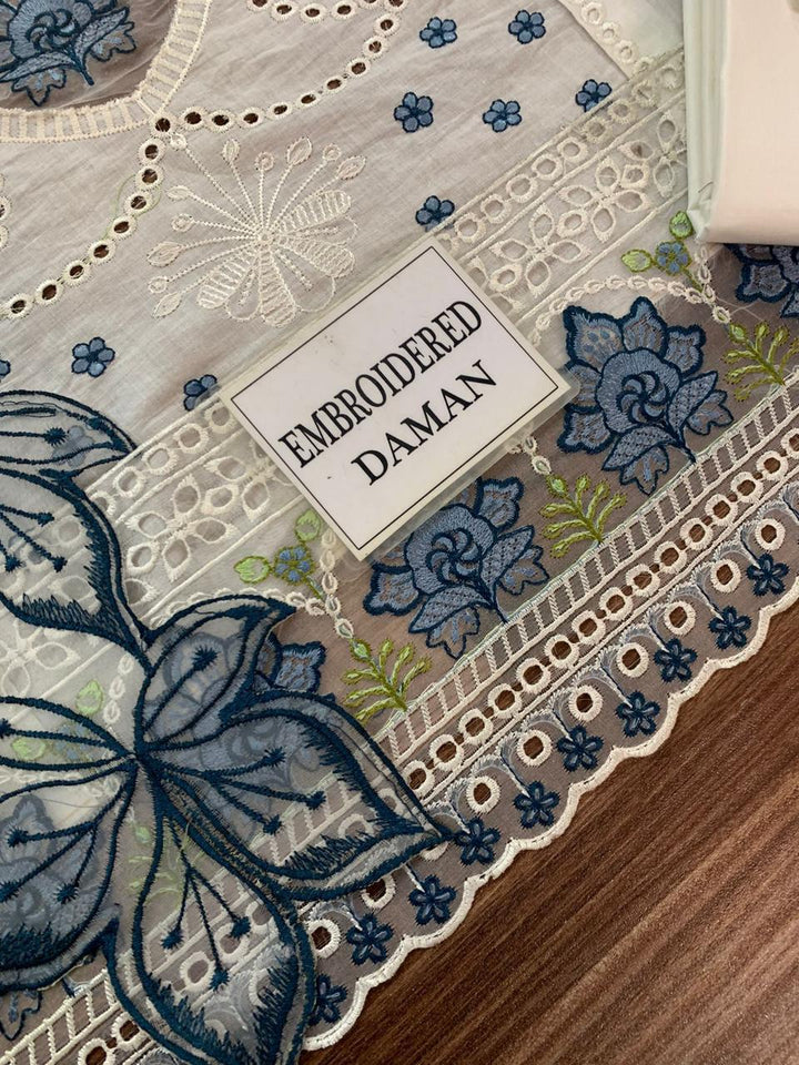 MAHNUR | Pearl Bloom – Ivory Embroidered Lawn 3-Piece Suit with Blue Floral Threadwork & Cutwork Details